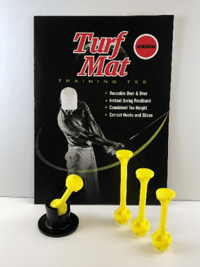 A book and some yellow plastic golf tees.