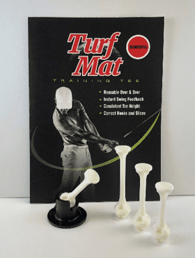 A book about golf hitting and the turf mat.