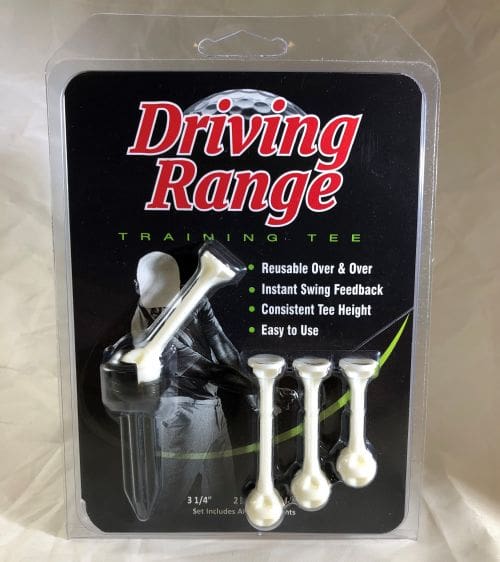A package of three golf tees with the driver in it.