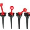 A set of four plastic spigots with red caps.