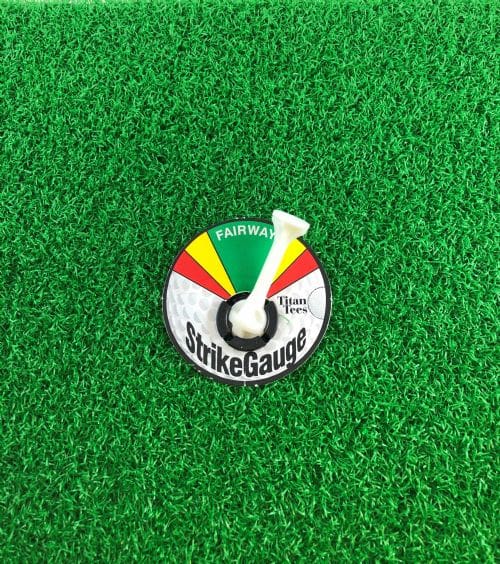 A green, yellow and red strike gauge on the ground.