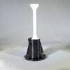 A black and white plastic object sitting on top of a table.