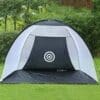 A tent with an archery target on the side of it.